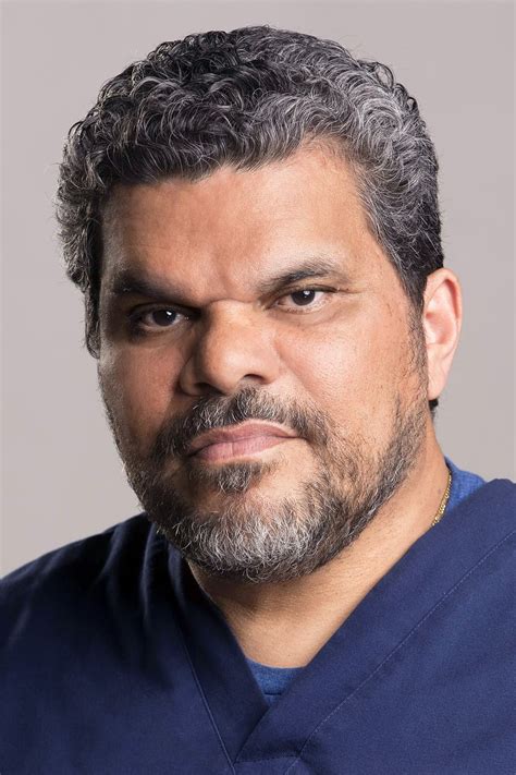Luis Guzmán .